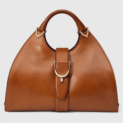 gucci stirrup tote|Stirrup leather top handle bag .